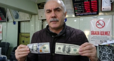 Bursa'da çarşı esnafı elle inceleyerek döviz alımına devam ediyor