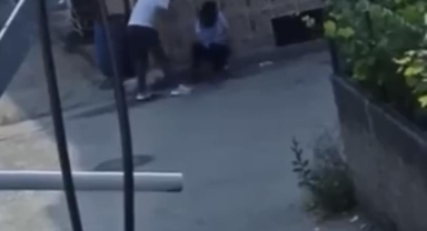 Tartıştığı kadını yol ortasında sürükleyip, zorla götürdü