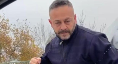 Meclis üyesini sıkıştırıp, aracı yumrukladı